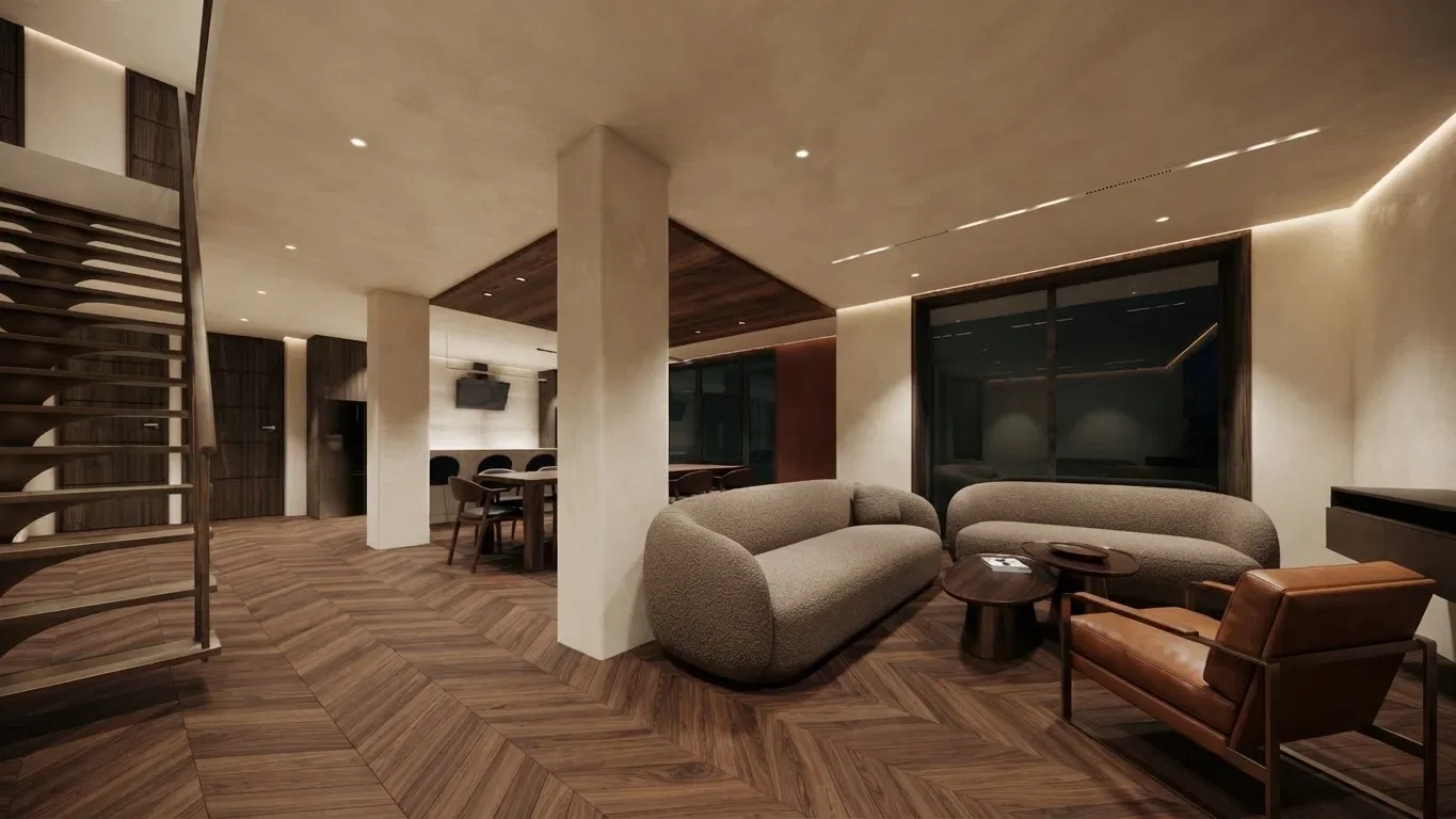 Séjour du duplex en ambiance du soir, escalier à limons, canapés bouclés et fauteuil en cuir