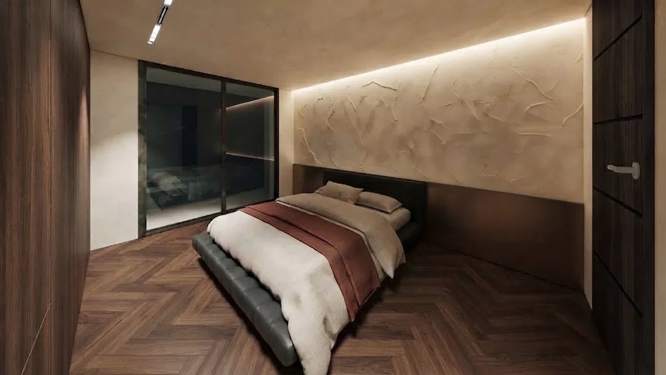 Suite parentale du duplex, mur en enduit travaillé rétroéclairé et parquet en chevrons